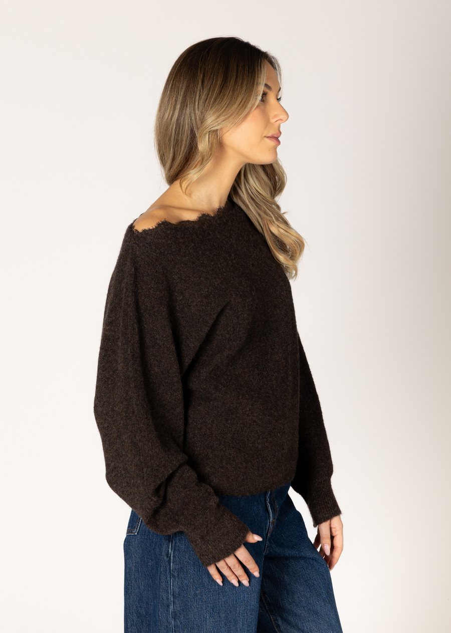Turn heads with this eco-conscious lace sweater, thoughtfully designed with both style and sustainability in mind. Featuring an alluring off-shoulder design, its relaxed fit adds a touch of effortless sophistication, making it the perfect piece for a glamorous night out or for elevating your everyday style.