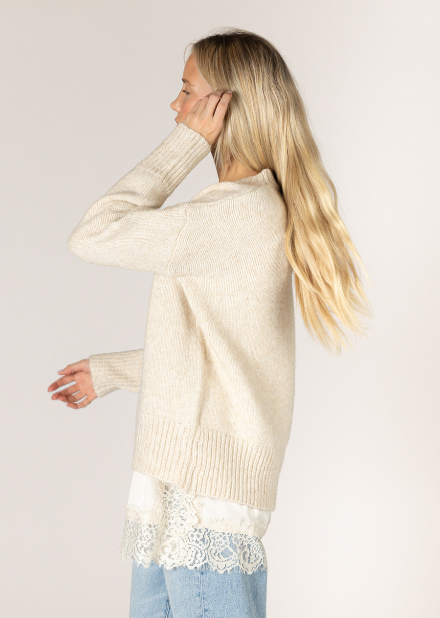 This classic crew sweater fits seamlessly into any wardrobe. This sweater offers a clean and stylish look while promising softness and durability. Whether you're layering the Tanya or just wearing it on its own, this sweater is perfect for any occasion. Does not come with lace top&nbsp;