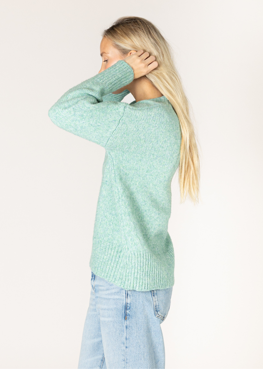 This classic crew sweater fits seamlessly into any wardrobe. This sweater offers a clean and stylish look while promising softness and durability. Whether you're layering the Tanya or just wearing it on its own, this sweater is perfect for any occasion.
