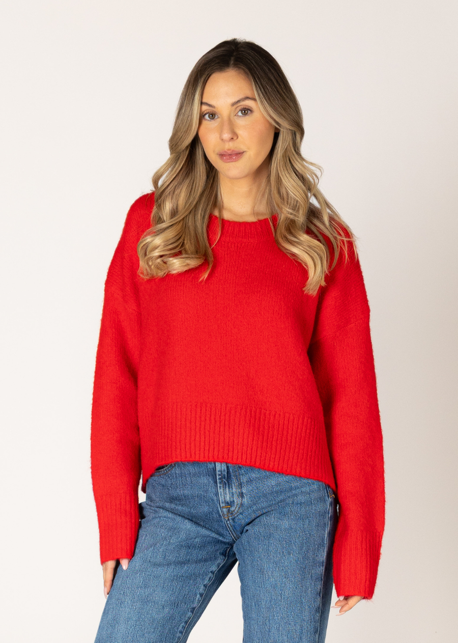 This sweater is a timeless must have, making it the perfect addition to any wardrobe. This classic crew design is effortlessly charming, featuring a ribbed hem and cuffs. Whether you're headed to work or having a casual day out, this sweater is sure to keep you cozy and stylish all day long.