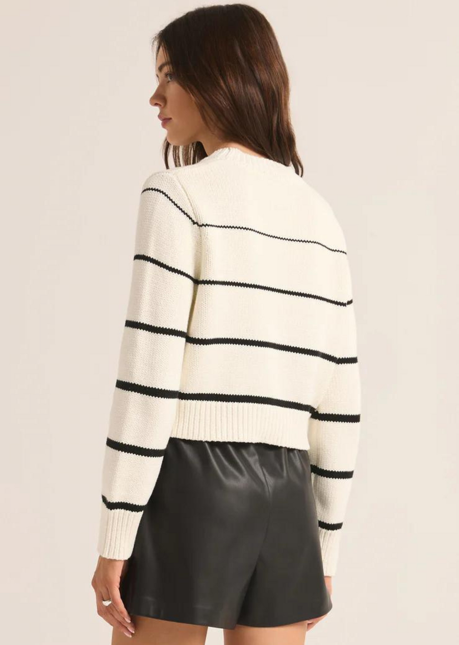 Z Supply Milan Stripe Sweater. This sweater is made using our cotton sweater yarns and features a classic placement stripe for eye-catching appeal. You'll love the soft, cozy feel and relaxed fit of this crew neck.