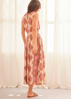 Nekane NKN Cut-Out Printed Dress. Long ethnic print dress. Cut-out at the waist. Tie closure in the back.