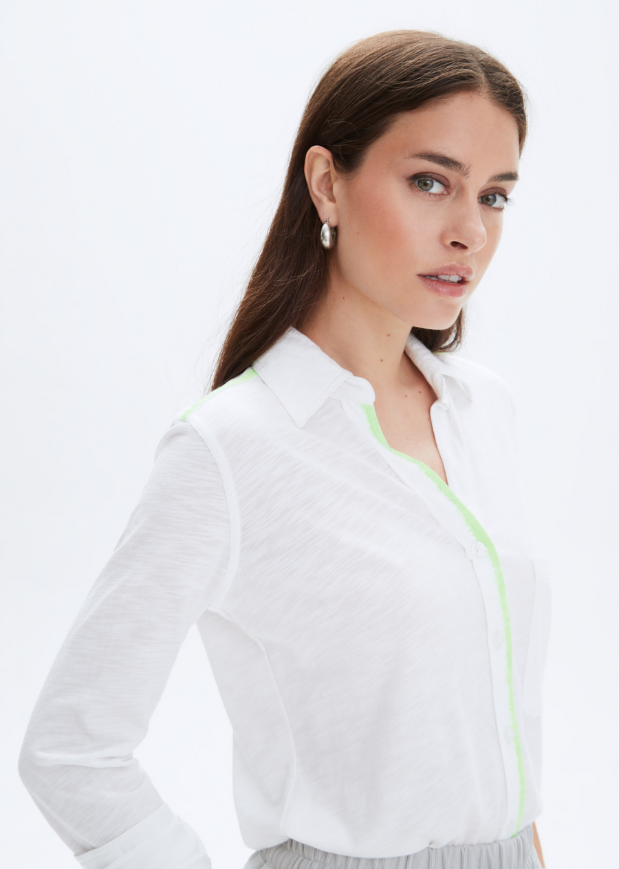 CHRLDR Neon Amrat Jersey Blouse. This classic blouse from CHRLDR is perfect for everyday. Constructed from soft and slightly sheer fabric, this blouse also features a scoop hem and single chest pocket.