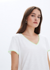 CHRLDR Neon Ava V-Neck Mock Layer T-Shirt. This mock layer t-shirt from CHRLDR is casual comfort at its best. Features a neon v-neckline, short sleeves and faux layer hem.