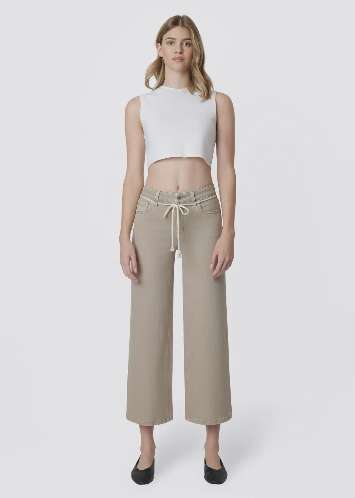 Effortlessly chic with a relaxed feel, The Olivia Drawstring Crop Wide Leg Jeans are the perfect blend of comfort and style. Designed with a flattering high-rise waist, soft stretch denim, and a unique cotton cord drawstring detail, these taupe-colored jeans bring a fresh twist to your everyday denim collection. The cropped wide-leg silhouette, finished hem, and classic five-pocket design create an easy, elevated look perfect for casual days, weekend outings, and vacation styling.