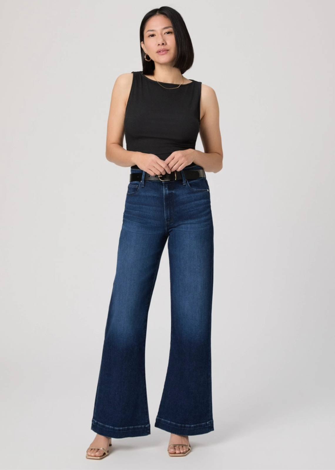 Designed with a flattering high rise and relaxed wide leg, the Leenah offers an easy, elongating silhouette with a 32" inseam. Crafted from TRANSCEND VINTAGE denim, this pair combines superior comfort with vintage-inspired texture and structure. Finished in the Basilica wash, it delivers timeless versatility with a softly worn-in feel.