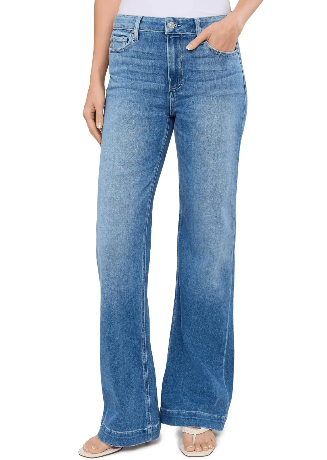 This sleek wide leg is designed with a high-rise and a flattering bow leg silhouette. PAIGE Vintage takes all of the work out of breaking in your favorite pair of vintage jeans. We've combined the comfort of stretch with everything you love about authentic vintage denim to create super soft jeans that feel perfectly lived-in from the very first wear.