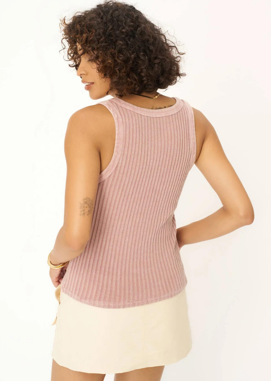 Project Social T Cooper Sweater Rib Tank- MW Blushing Mauve. Our Cooper Sweater Rib Tank is the perfect blend of the comfort and fabric of your favorite sweater with the flattering fit of your go-to tank top. The wide rib fabric, scoop neck, and fitted silhouette keep this tank looking structured while still feeling comfy. Dress up with leather pants and heels for a night out or keep it casual with jeans for a weekend vibe.