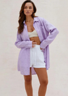 Charli Provence Shirt- Lilac. Provence Shirt is a versatile relaxed fit Linen boyfriend shirt with a subtle stripe. An easy throw on this summer that you can team with relaxed soft tailored pants, denim or as an easy beach cover up. Button up shirt with tab on sleeve to for a rolled-up sleeve styling option.