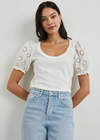 Rails Lilia Top.Leave your basic white tees behind, the Lilia is here to elevate your summer essentials. With daisy-embroidered puff sleeves and a traditional t-shirt body crafted from soft, pliable vintage cotton jersey.