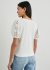 Rails Lilia Top.Leave your basic white tees behind, the Lilia is here to elevate your summer essentials. With daisy-embroidered puff sleeves and a traditional t-shirt body crafted from soft, pliable vintage cotton jersey.