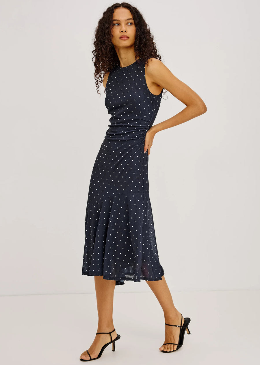 Cut from self-lined stretch mesh, the Daija Dress is a midi-length design with a high neckline and fitted bodice, detailed with side waist ruching and an asymmetrically twisted shoulder strap. It falls into a fluted, bias-cut skirt with an asymmetric hem.