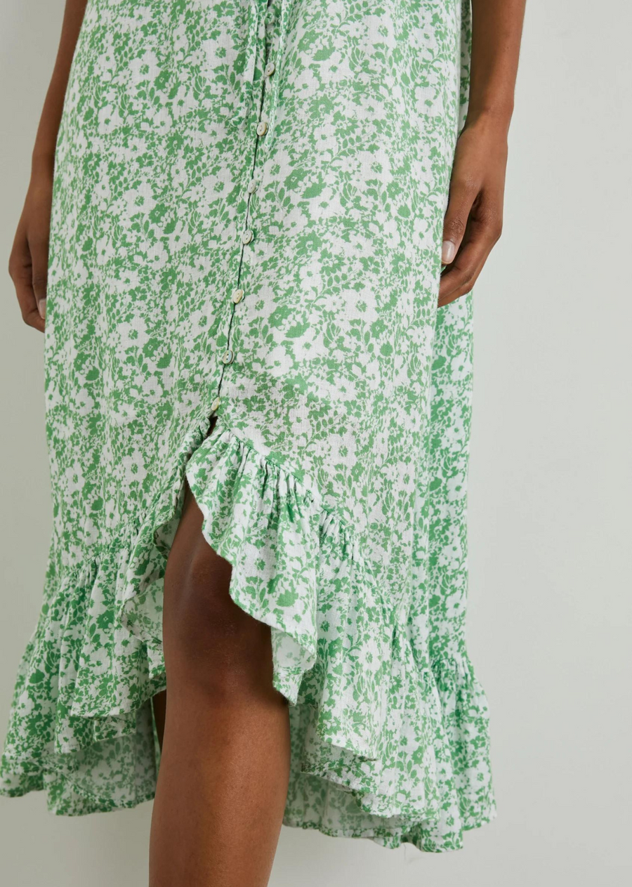 Rails Frida Dress- Green Texture Floral. The Frida Dress—with a midi length and rayon-crepe texture—works for your every day, but in an elevated way. It's comfortably lined with thin, adjustable shoulder straps and fabric-covered buttons. What catches the eye is the vibrant floral print, swingy silhouette, and flattering high-low hem.