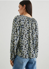 Rails Indi Top. <p><span>The Indi Top makes any outfit pairing look polished, whether it be denim, a midi skirt, or trousers. It's a collarless blouse with voluminous sleeves, natural shell buttons, and a beautiful, 70s-inspired floral print.</span><br><span></span></p> <p>&nbsp;</p>