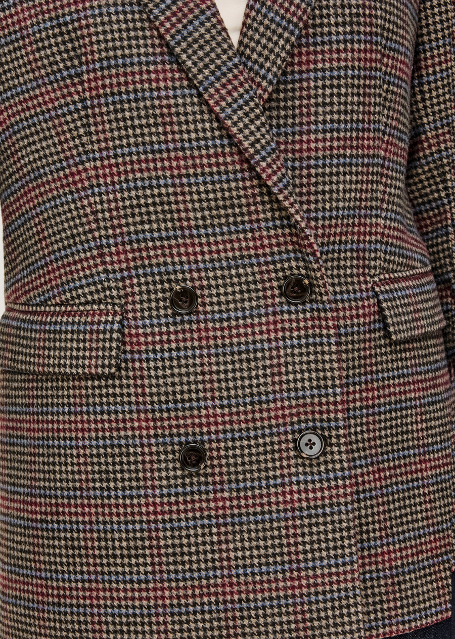 The Jac Blazer is a double-breasted silhouette in a soft, wool blend, with notched lapels, long sleeves, and side flap pockets. Fully lined for polished comfort.