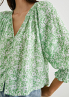 Rails Mariah Top-Green Texture Floral. This pretty pullover top features natural shell buttons, elastic smocked detailing at cuffs, and a relaxed fit.