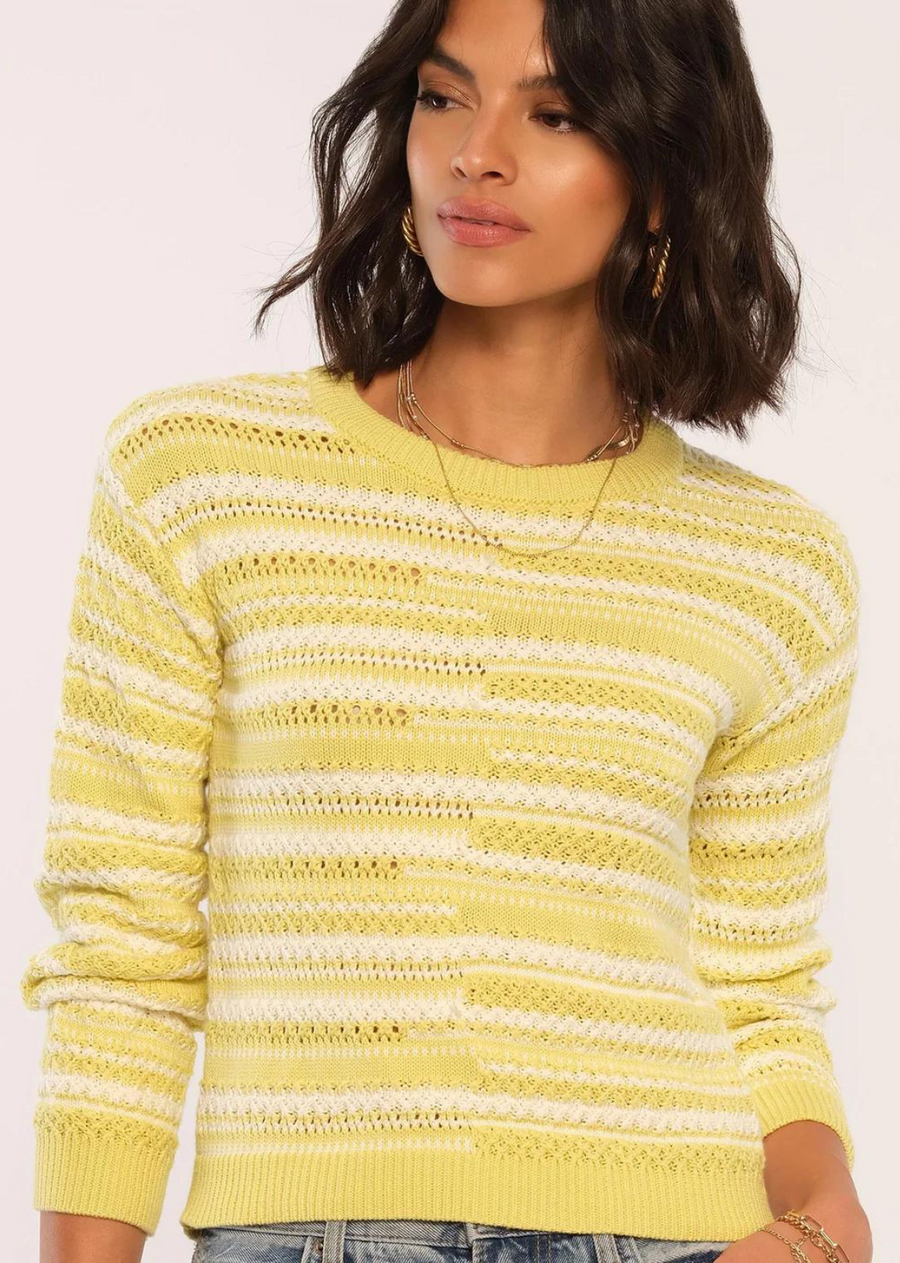 Heartloom Rubie Sweater. The Rubie Sweater is made of our soft yarn and features a playful striped pattern. It has a relaxed fit and ribbed edges. Pair with joggers or jeans for an easy warm-weather look.