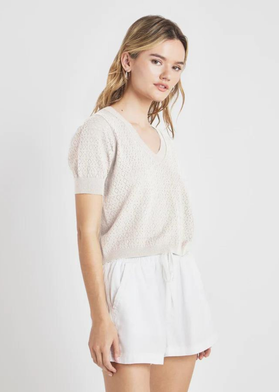 Splendid Sadie Short Sleeve Sweater. The Sadie Short Sleeve Sweater is made for spring with its ribbed V-neck, short puff sleeves and that stunning pointelle stitch pattern. It's slightly cropped and easily hovers over your high-waisted go-to's.