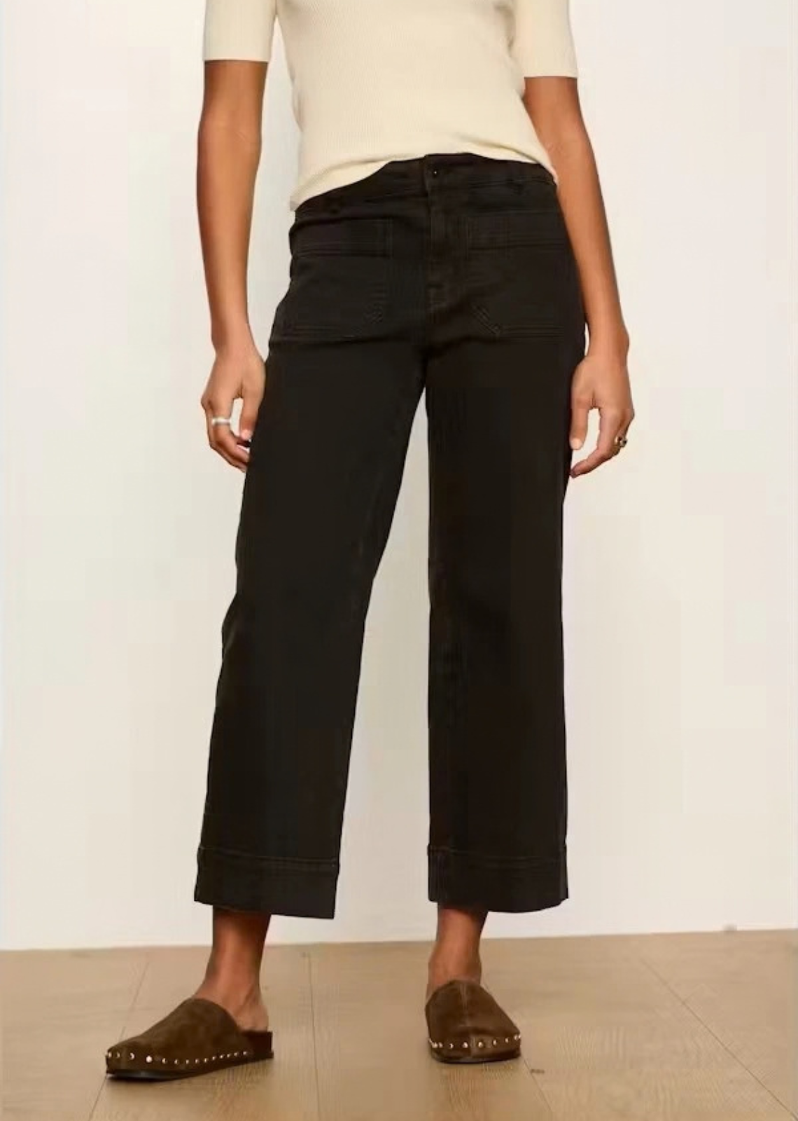 These dark charcoal/faded black pants combine utilitarian workwear elements with a modern, relaxed silhouette. Offering a laid-back yet structured look, they blend casual comfort with everyday versatility—perfect for effortless transitional styling.