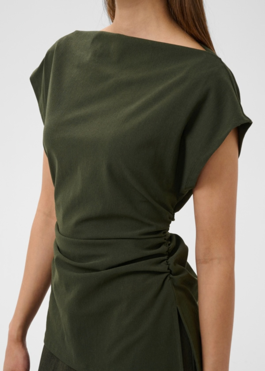 Sleeveless top with a straight silhouette, wide boat neckline, and subtle gathered details at the waist. Features a smooth finish and falls to the hip for a clean, modern look.