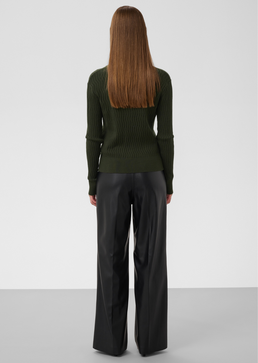 Bring subtle texture and polished charm to your capsule wardrobe with this button-down cardigan in rich forest green. Combining a classic silhouette with a modern, wavy ribbed finish, it offers a versatile piece that transitions seamlessly from day to night.
