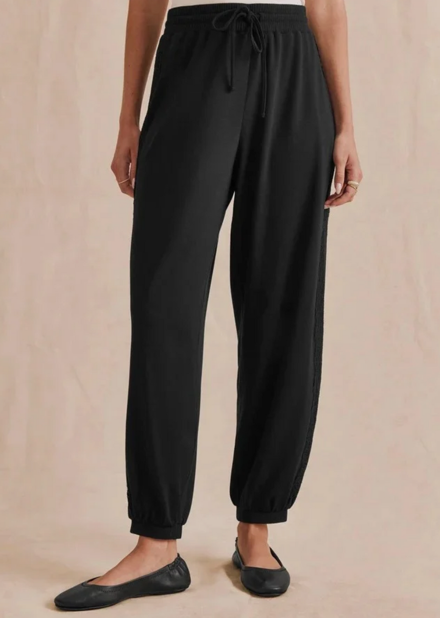 Your favorite joggers, with a little something extra. Relaxed fit, ultra-soft fabric, and a drawstring waist, this signature style is finished with delicate lace trim down the sides for a feminine touch.