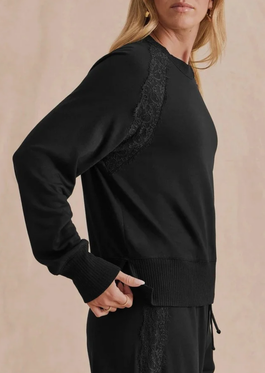 The softer side of loungewear. We added delicate lace trim along the shoulders of this classic crewneck and kept the easy fit and feel you love. Perfect with the matching Lace Trim Jogger or your favorite denim.