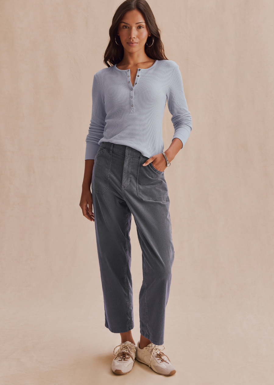 A modern take on classic corduroy. The Carissa Corduroy Pant blends timeless texture with laid-back polish, thanks to its soft stretch-cotton blend and relaxed, straight-leg fit. Designed with utility-inspired patch pockets, a flattering high rise, and a comfortable elastic back waistband, it's the kind of pant that becomes an instant favorite. We finished it with lived-in color for an effortlessly cool look, and gave it an ankle-grazing hem for easy pairing with boots or flats.