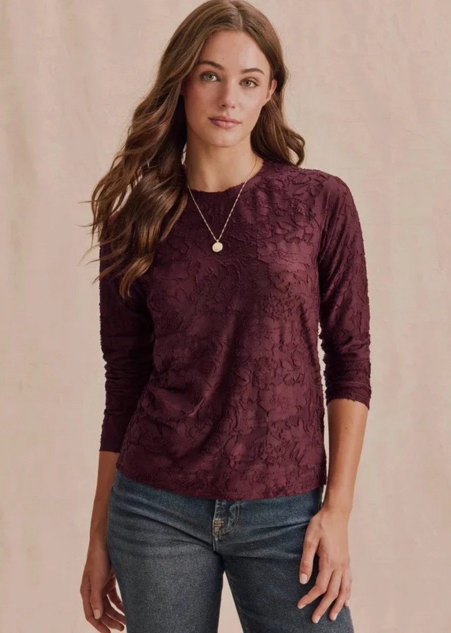  Feminine meets functional in our Cecelia Floral Long Sleeve Tee-- a refined top that feels casual but looks trés chic. Made from a sheer burnout fabric with a lovely embroidered floral pattern. It's bodycon fit is perfect for layering and tucking into jeans. Top it over your own cami for added coverage. 
