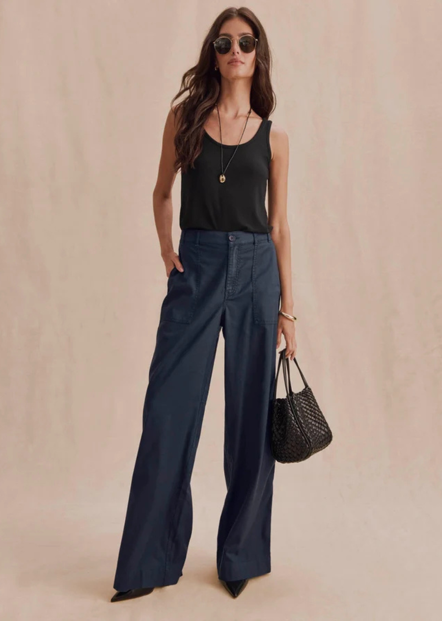 A wide leg pant with a clean silhouette and soft structured feel. The Colette Pant balances relaxed comfort with a more refined shape, making it an easy option for everyday styling through the season.