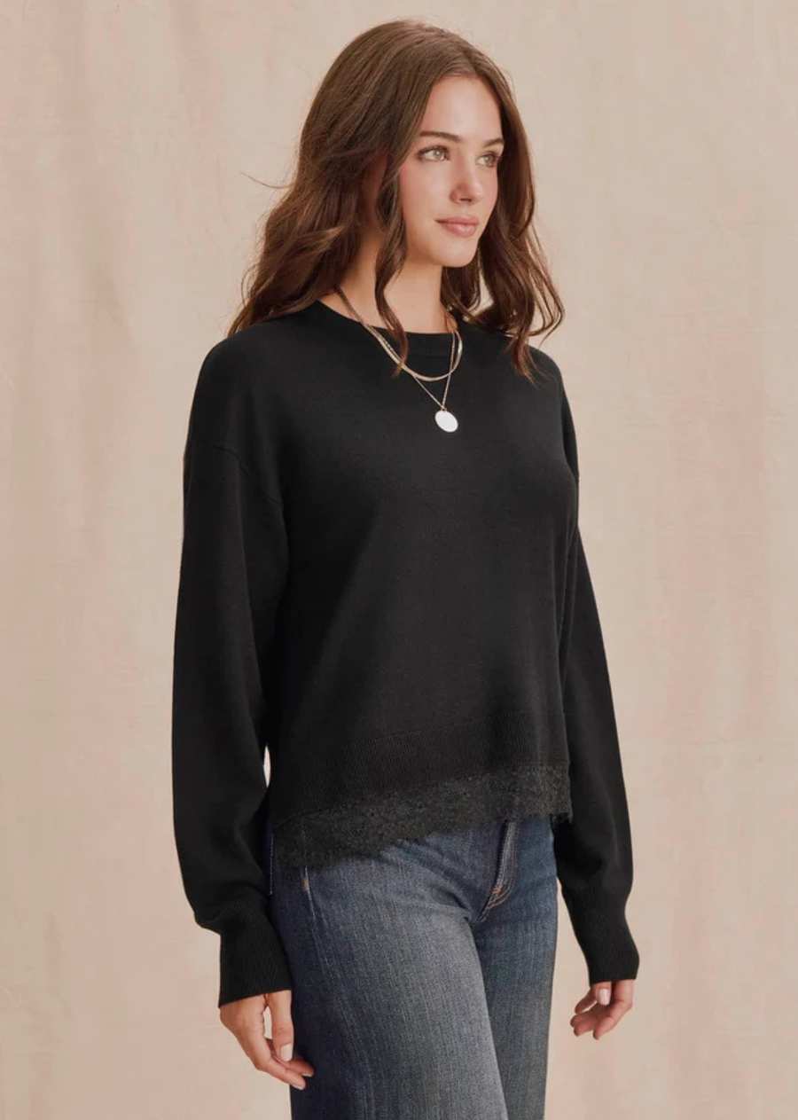 A soft pullover finished with delicate lace trim for a feminine touch. Easy to dress up or down, the Georgie Lace Trim Pullover brings texture and contrast to denim, trousers, and tailored layers.