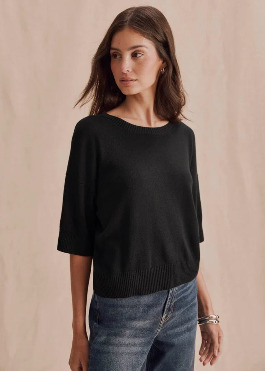 A soft short sleeve sweater with a clean silhouette and easy drape. The Georgie Short Sleeve Sweater brings a refined feel to denim, trousers, and layered looks.