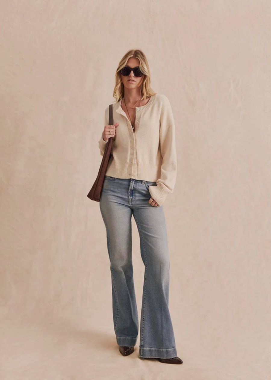 A soft cardigan with a clean, cropped silhouette that layers with just about everything. Wear it buttoned up or open over your favorite tee or tank.