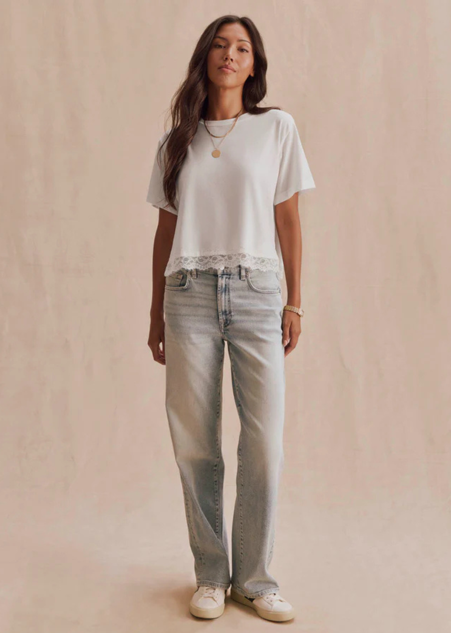 A classic short sleeve tee finished with delicate lace trim for a softer, dressed-up feel.