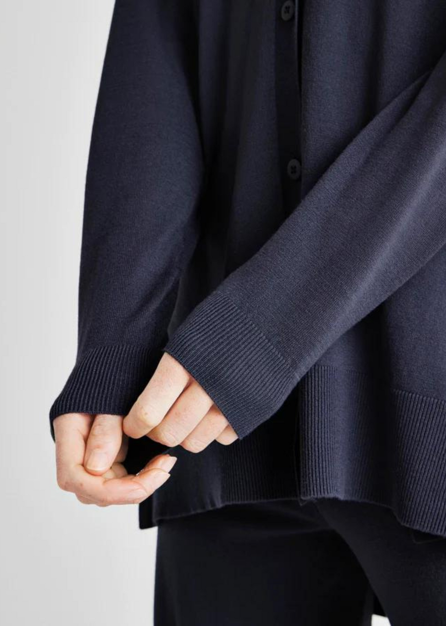 Splendid Veronica Tunic Cardigan. Made from a silky smooth fabric that's soft to the touch, our Veronica Tunic Cardigan transitions seamlessly from days at the office to weekend brunch plans. Crafted in a super relaxed tunic length with a V-neck and button closures. Top it over anything-- even swimwear.