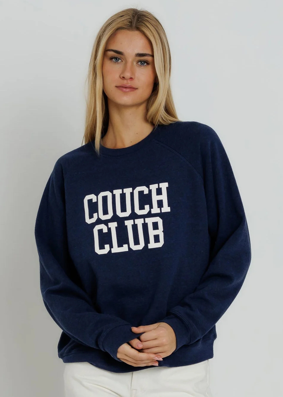 Our Raglan Crew sweatshirt offers a relaxed and sporty fit, designed for comfort and freedom of movement. It is perfectly oversized, with the hem sitting around the hips, making it perfect for layering or wearing on its own for a casual, laid-back style.

The Couch Club Raglan Crew is made for taking it easy. Cozy, playful, and effortlessly laid back, it’s inspired by slow Sundays, movie marathons, and plans that involve staying in. Made for lazy mornings, takeout nights, and your favorite spot on the couch