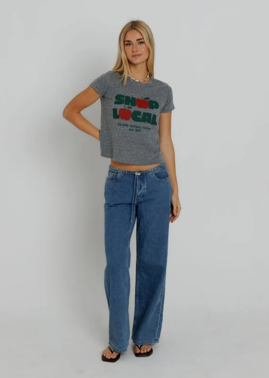 The Shop Local Femme Crew is a feel good nod to neighborhood favorites and slow, simple days. Inspired by weekend farmers markets and fresh picked finds, it brings an easy, nostalgic charm to your everyday rotation. Made for morning strolls, market hauls, and supporting the spots that make your town feel like home.