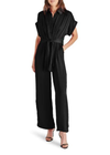 Steve Madden Tori Jumpsuit. Introducing the TORI jumpsuit. This washed satin jumpsuit features a tie front detail, wide-leg pants, and dolman sleeves. With a button front, collar neckline, and rolled sleeves, this jumpsuit is perfect for any season. Elevate your style with this satin beauty.