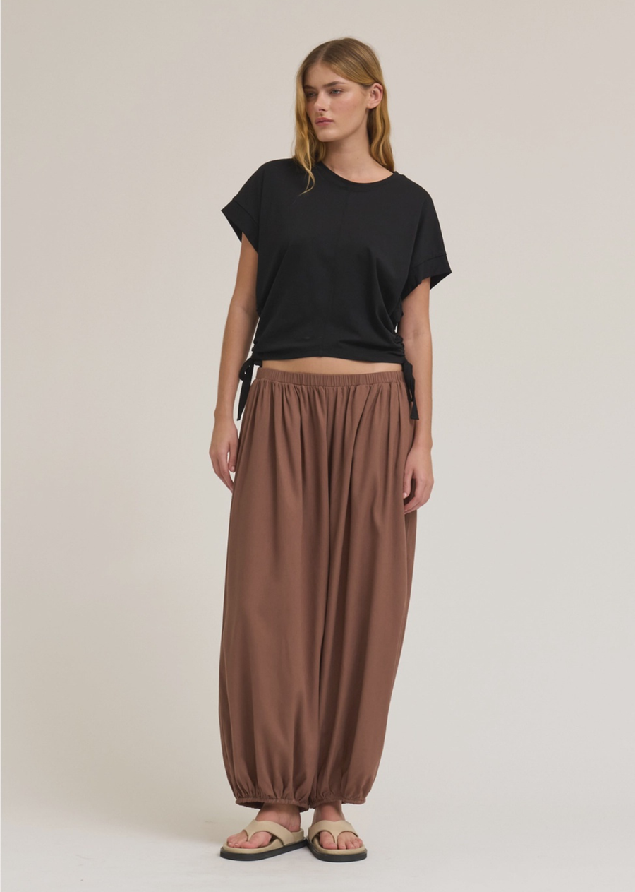 Add a flattering twist to your everyday basics with this side scrunch tee. Designed with adjustable ruched detailing along the side, it creates a beautifully contoured silhouette while offering a comfortable, easy fit.