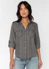 Velvet Heart Riley Shirt-317 Starlight Grey.The Riley collared button-up shirt features rolled tab sleeves, double chest pockets, a split back tail, and a frayed hem. This shirt is a perfect staple to any wardrobe.