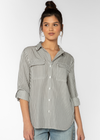 Velvet Heart Talma Shirt- Charcoal Stripe. The Talma Shirt features roll tab sleeves, a button front, flap chest pockets, and a slight high-low hem. This eco-friendly shirt drapes comfortably providing an effortless, casual fit.