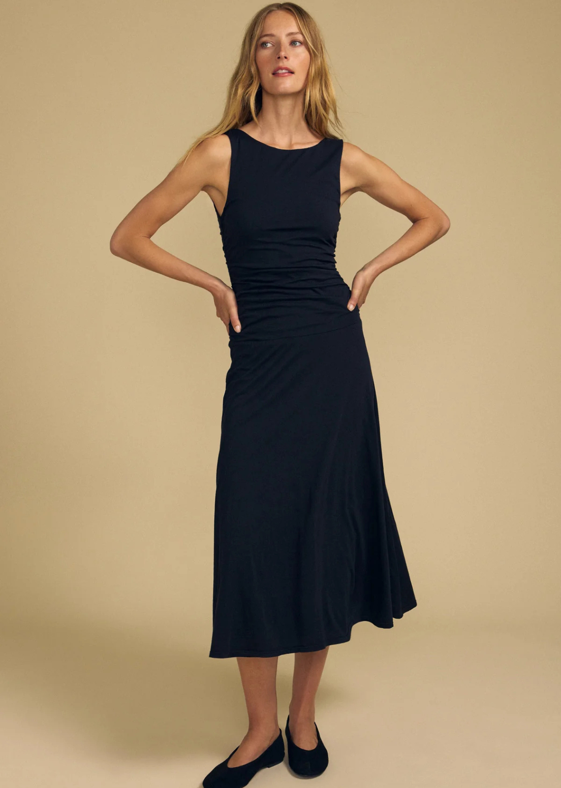 Light and airy in our signature gauzy whisper, this lined midi dress features a round neckline with a subtle V at the back for a touch of elegance. Shirring through the bodice and along the back seam adds soft texture and shape.