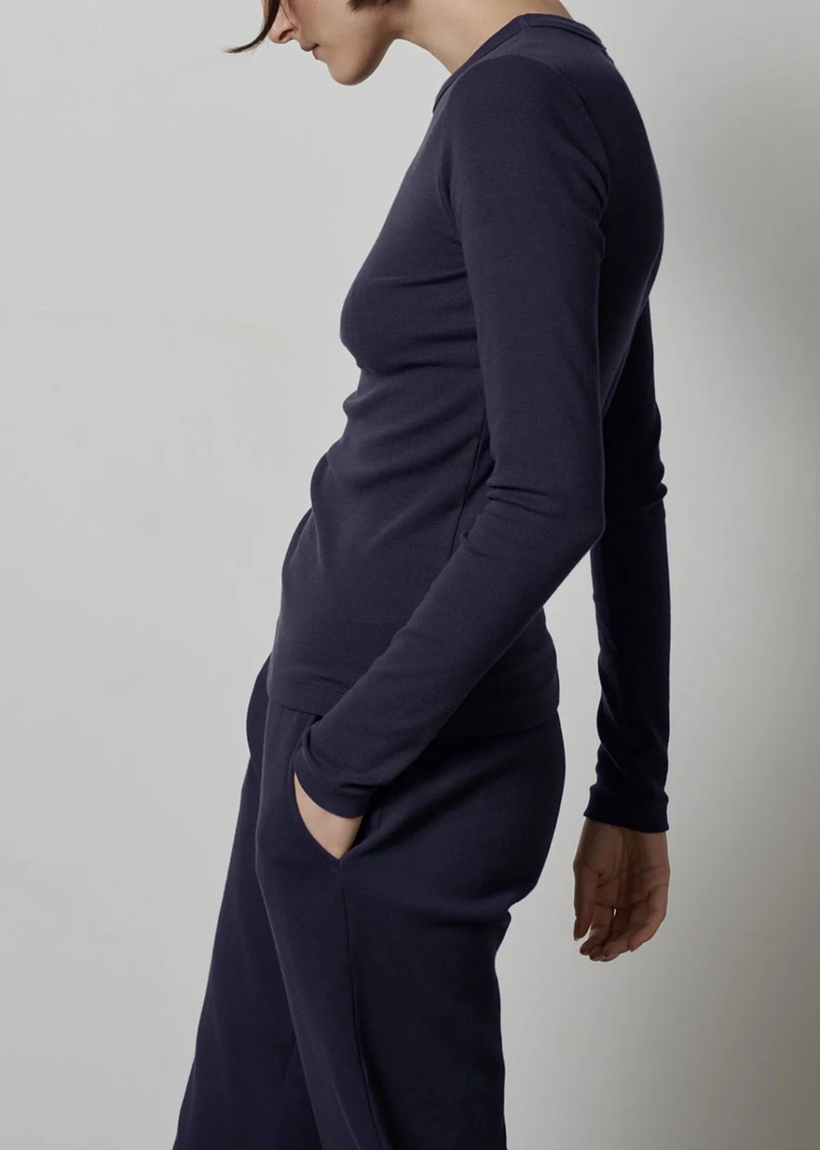 This modal rib feels super soft against the skin and is designed with a slimmer fit so it can effortlessly layer under knits or a blazer. Featuring a neck binding with a flat stitch finish for ultimate comfort and double stitch cuffs and hemline. Versatile, chic and truly timeless.