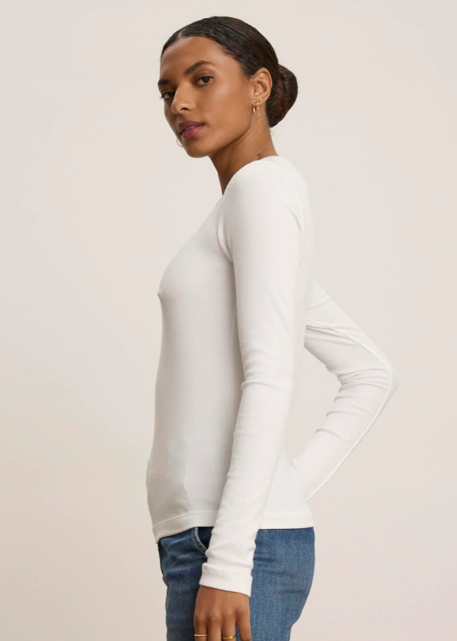 This modal rib feels super soft against the skin and is designed with a slimmer fit so it can effortlessly layer under knits or a blazer. Featuring a neck binding with a flat stitch finish for ultimate comfort and double stitch cuffs and hemline. Versatile, chic and truly timeless.