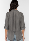 Velvet Heart Riley Shirt-317 Starlight Grey.The Riley collared button-up shirt features rolled tab sleeves, double chest pockets, a split back tail, and a frayed hem. This shirt is a perfect staple to any wardrobe.