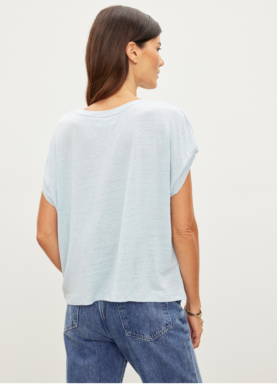 Velvet Hudson Crewneck Tee.Crafted from a linen knit, which has a heathered texture and soft hand, this has the silhouette of a classic muscle tee but with some feminine tweaks such as raw edge detailing on the sleeves and a hemline that hits just below the natural waist.