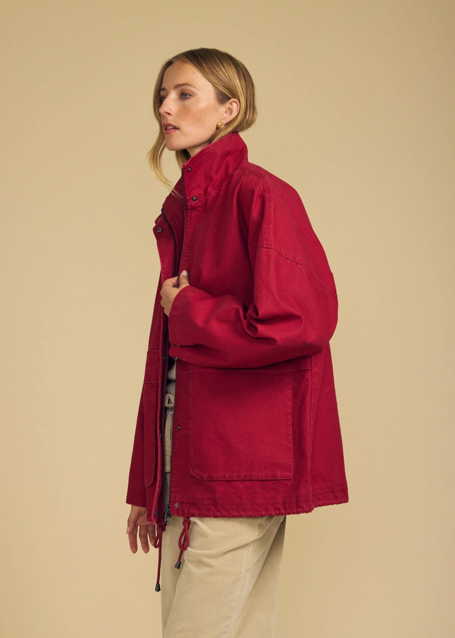 Built for the elements, the Hunter is a cotton canvas parka designed for everyday cold-weather wear. It features a zipper front with a snap button placket cover, mock neckline, snap button cuffs, a drawstring hem, and oversized front patch pockets with flap covers for added function. The cotton canvas holds its shape while remaining comfortable for all-day wear. Layer it over knits for a polished, cold-weather uniform.