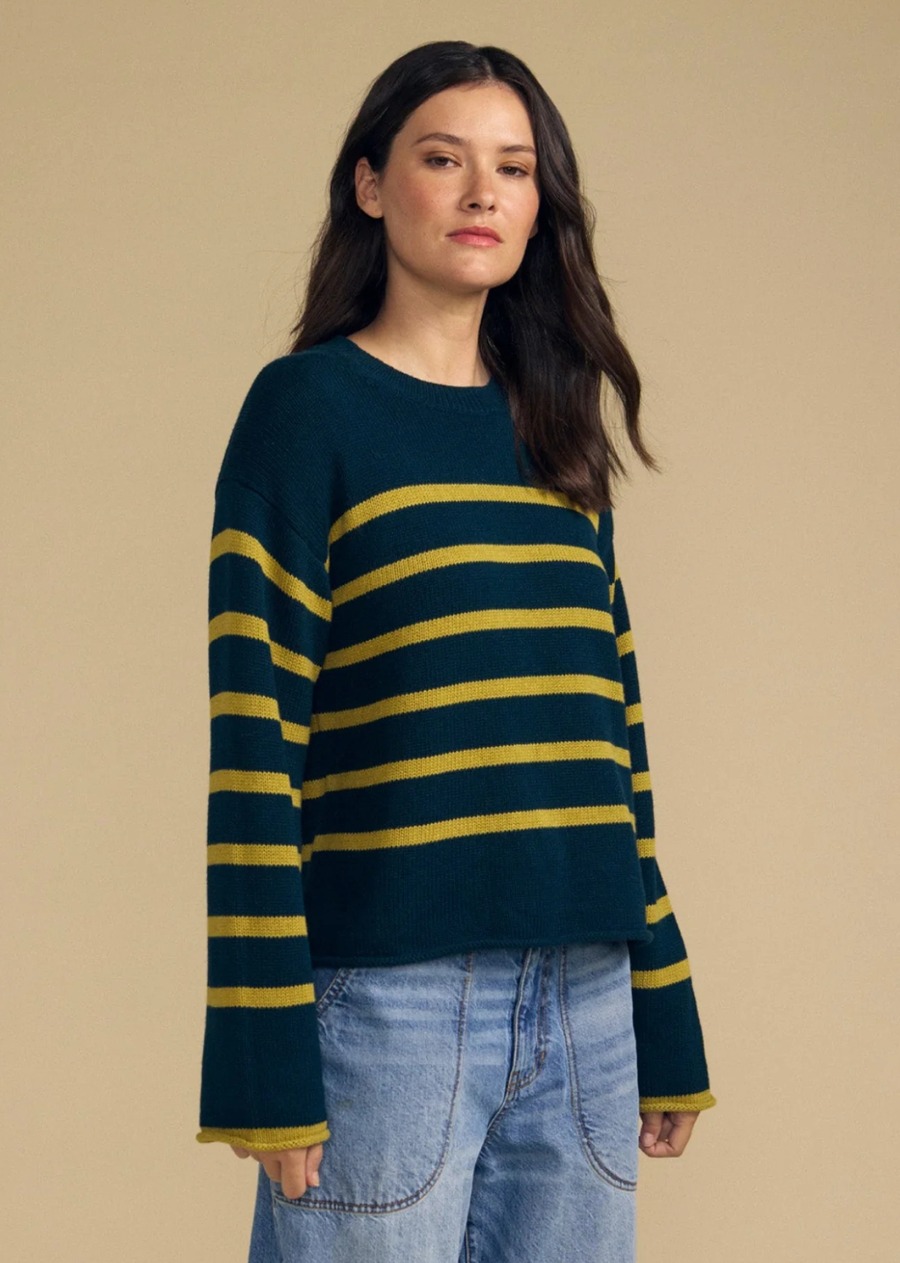 This soft, relaxed-fit sweater is crafted from a cotton-cashmere blend for everyday comfort. Featuring a ribbed crew neckline with rolled cuffs and hem, it offers a timeless silhouette with subtle texture.