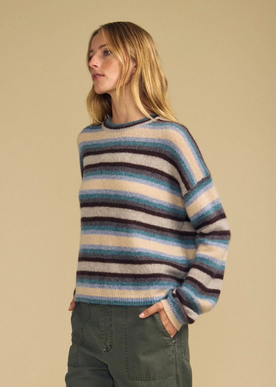 A cozy classic, the Mae is a striped wool-cashmere sweater designed for everyday comfort. It features a crew neckline, long sleeves, ribbed trims, and a relaxed fit for easy, everyday wear. The wool-cashmere blend offers a soft, plush hand-feel with natural warmth. Pair it with denim for a casual day, or tucked into trousers for a polished, elevated look.
