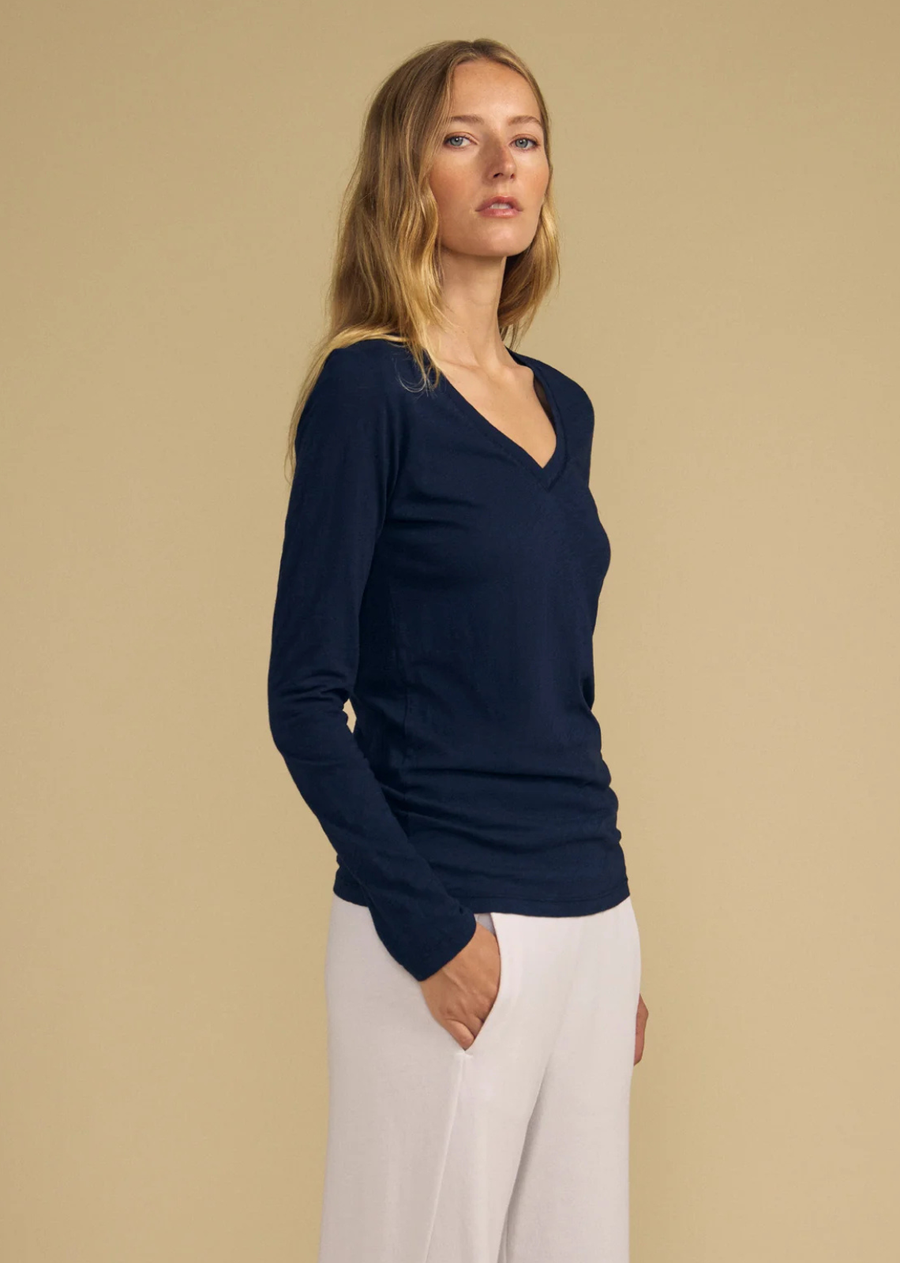 Made from a textured cotton slub, this tee features a flattering v-neckline and long sleeves. Perfect for everyday wear, you'll find yourself reaching for it time and time again.